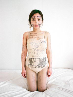 Arist Ji Yeo invites strangers to draw on her body.