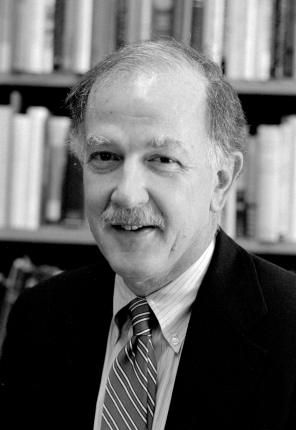 Black-and-white image of Peter Duus, a white man with a mustache wearing a suite and tie.