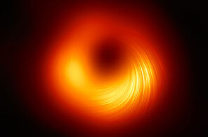 An image from the Event Horizon Telescope shows a massive black hole in the nucleus of the nearby galaxy M87