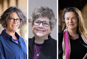 Photo of the three co-creators of the medical humanities minor: Tanya Luhrmann wearing glasses and a blue blouse; Audrey Shafer wearing glasses and a black blazer over a dark purple shirt; and Lara Wittman wearing a black blouse with a pink silk scarf draped over her shoulders 