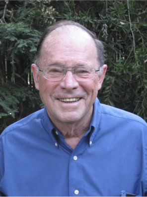 Image of Walter Harrison in a blue button up shirt