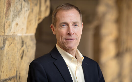 Portrait of James Gross in the Stanford arcade