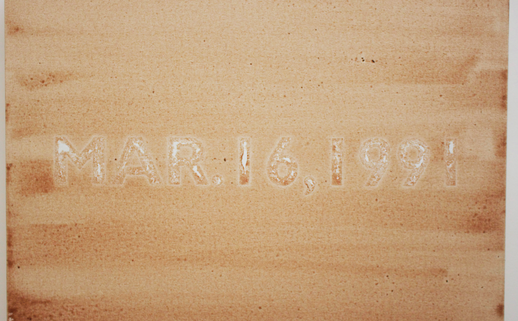 A horizontal canvas covered by orangish brown streaks and the date Mar. 16, 1991 prominently stamped in the middle