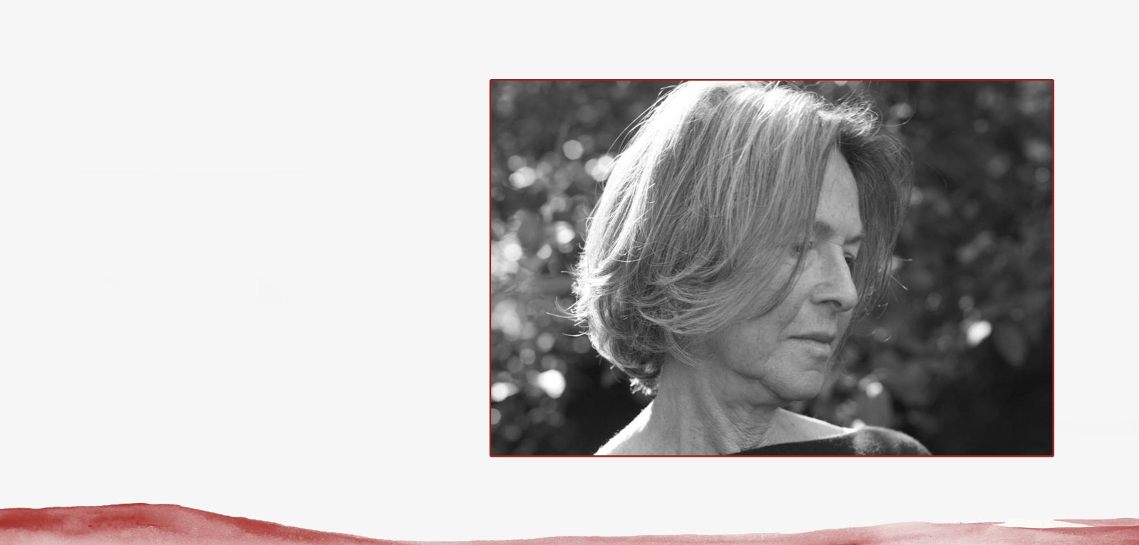 Photo of poet Louise Glück over a gentle wave of red in various gradients