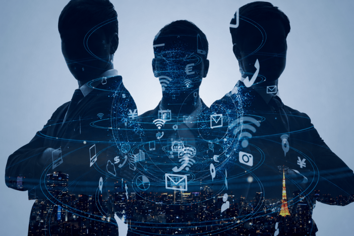 Three dark male silhouettes with tech symbols overlaid on them