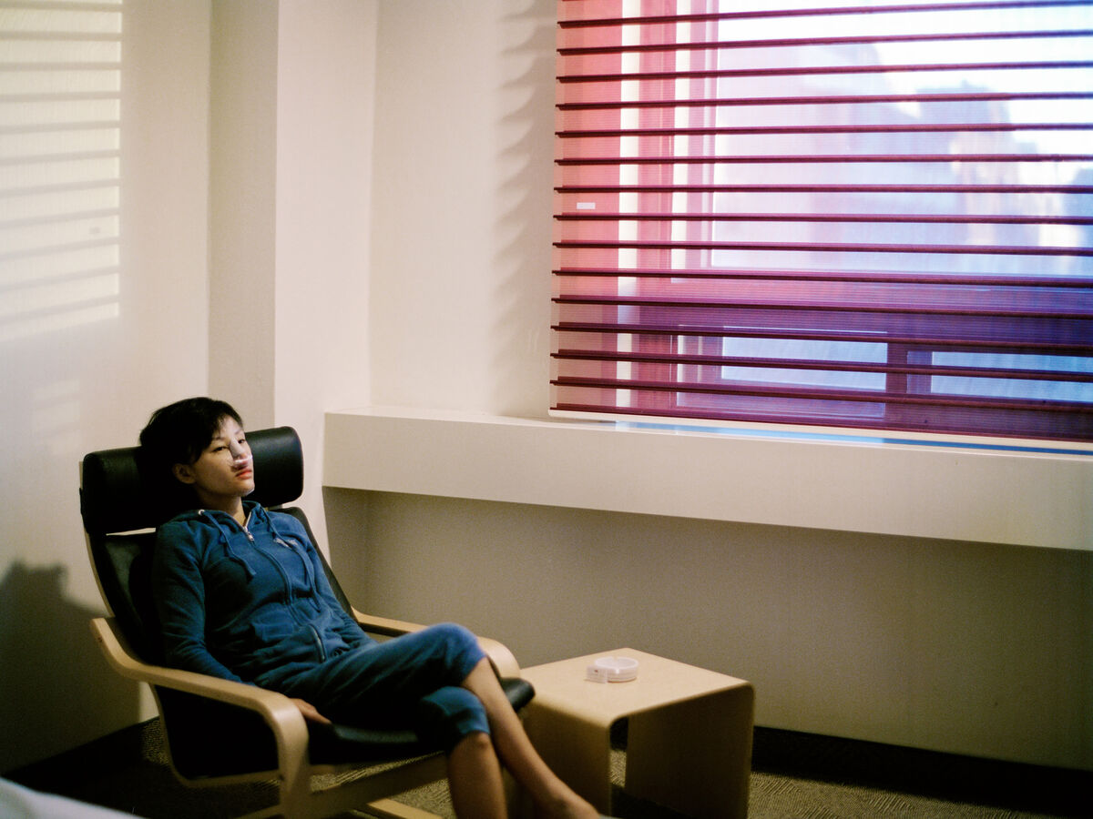 A bandaged South Korean woman recovering from plastic surgery.