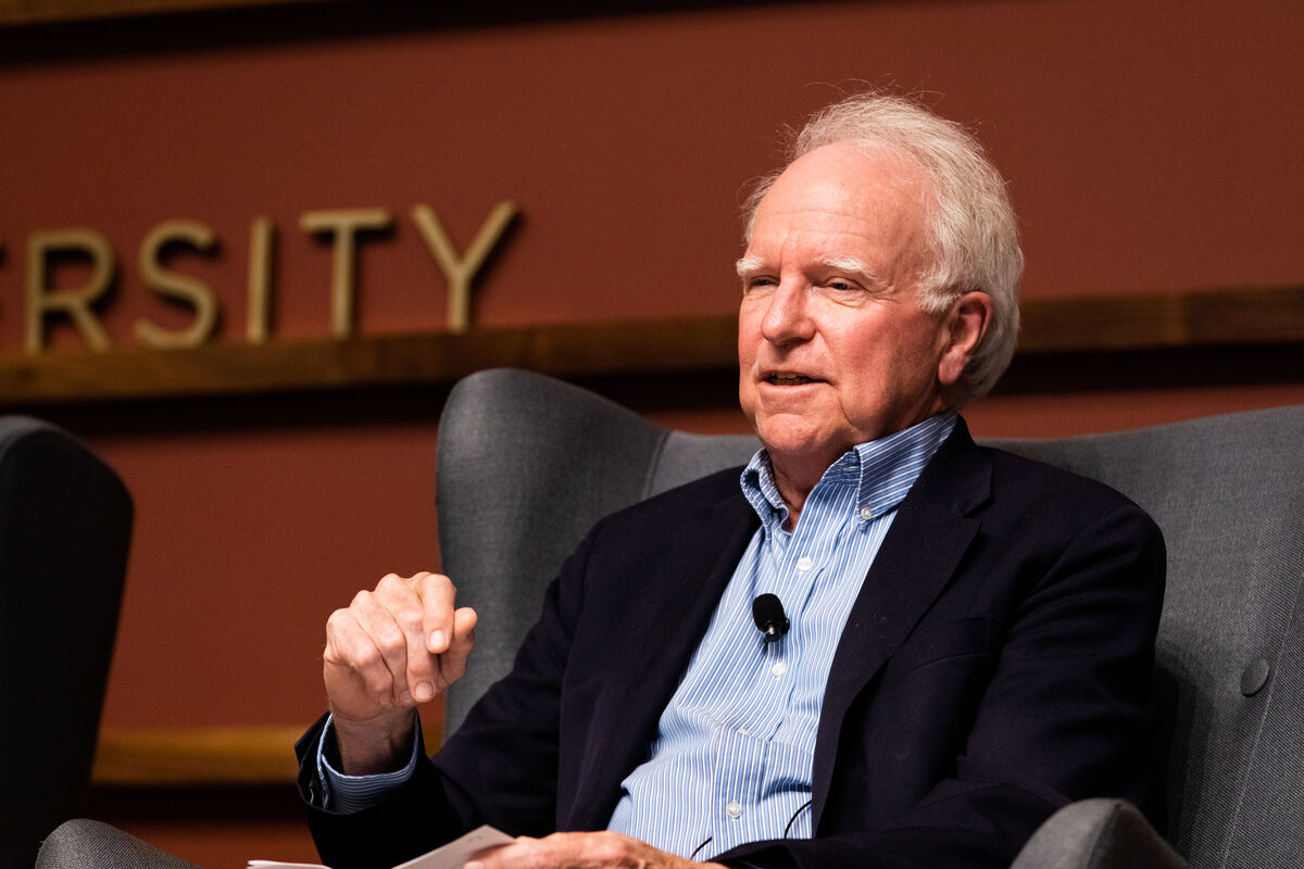 Image of Robert E. Hall speaking on a panel at Stanford University