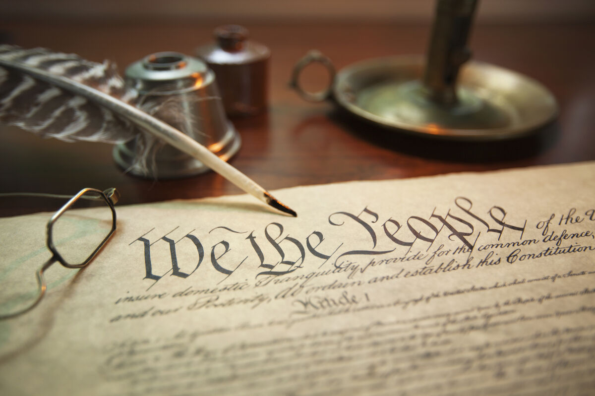 Image of the Constitution with "We the People" in focus