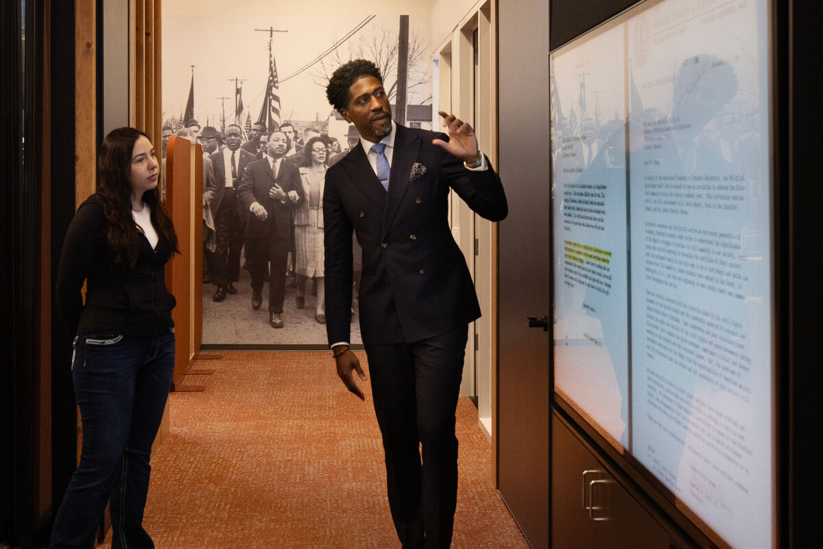 Lerone and student at the interactive screen 