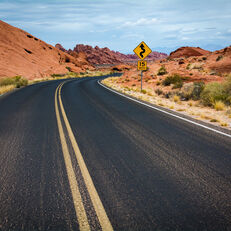 Road that curves around a hill