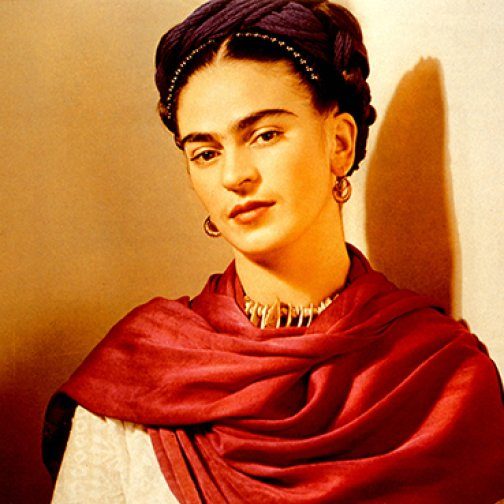 Artist Frida Kahlo, wearing a red scarf.