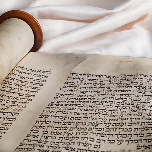A scroll with Hebrew text