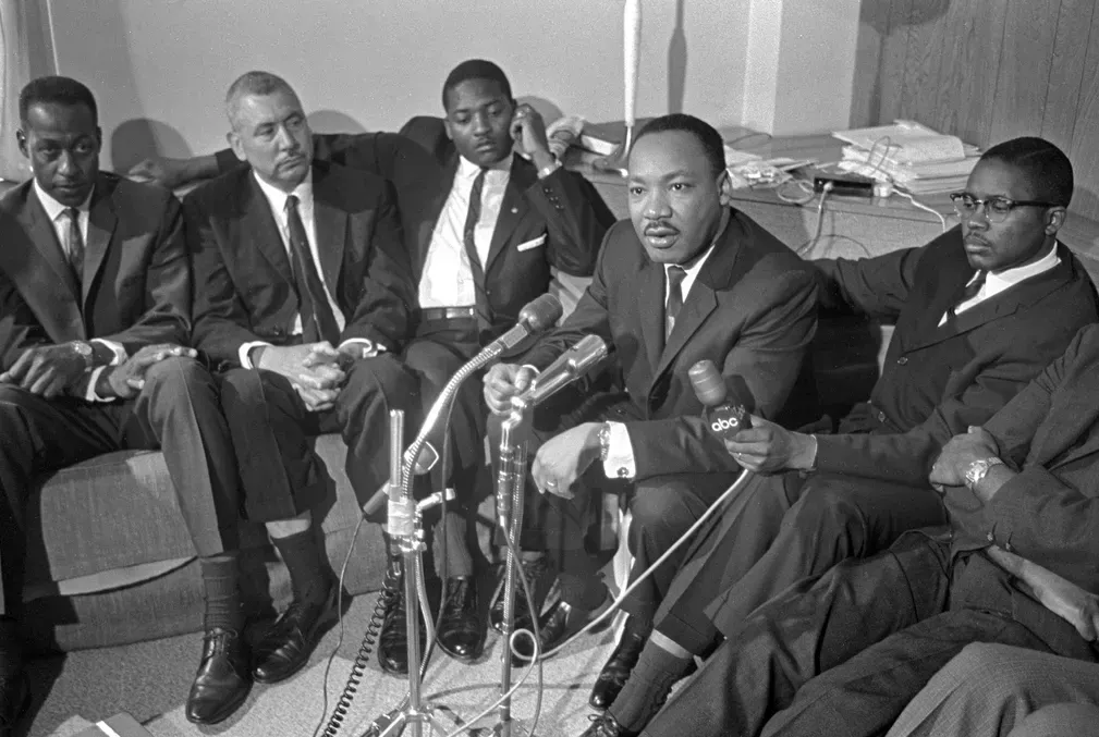 MLK Jr. surrounded by microphones. Atlanta, GA, 1966: Alabama candidate press conference
