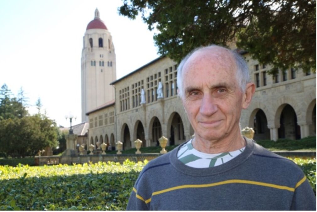 Yakov Eliashberg stands near the entrance to Stanford University