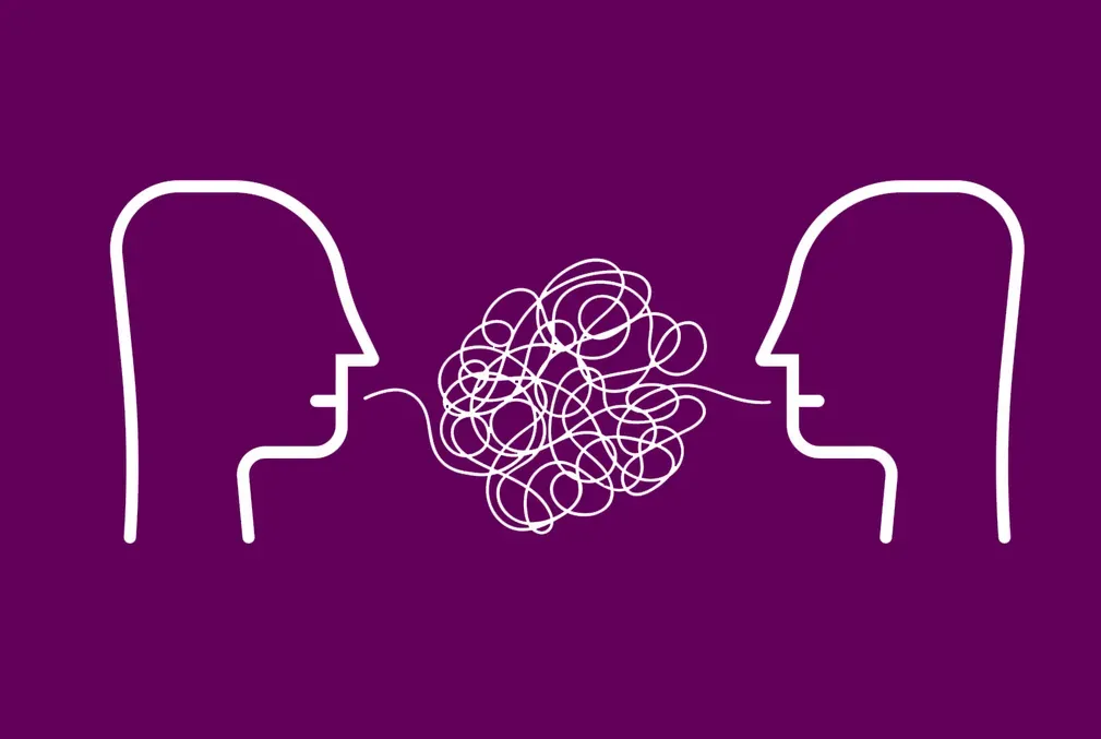 Two heads facing each other over a knot of conversation