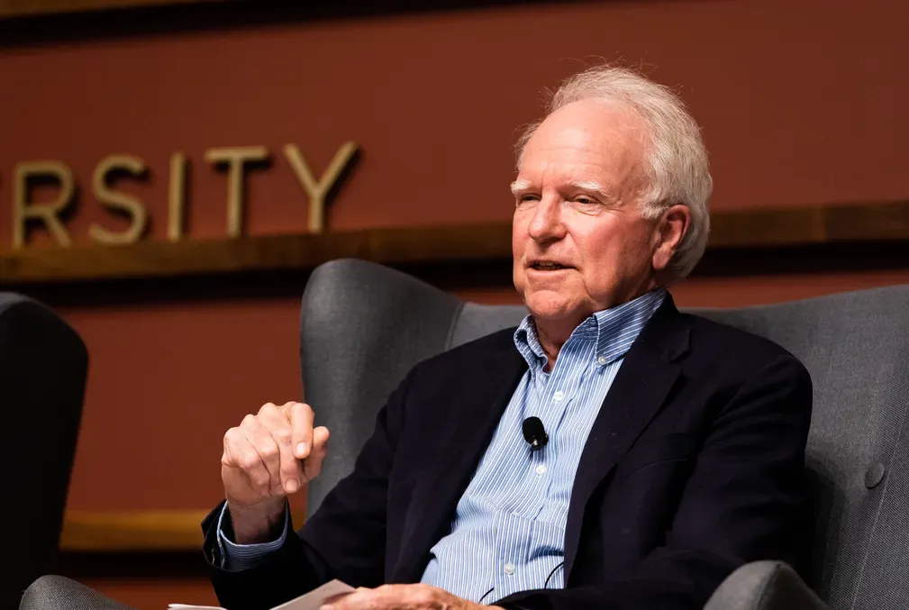 Image of Robert E. Hall speaking on a panel at Stanford University
