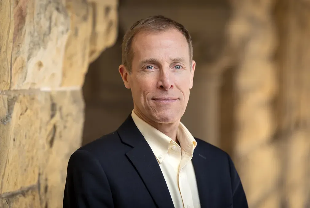 Portrait of James Gross in the Stanford arcade