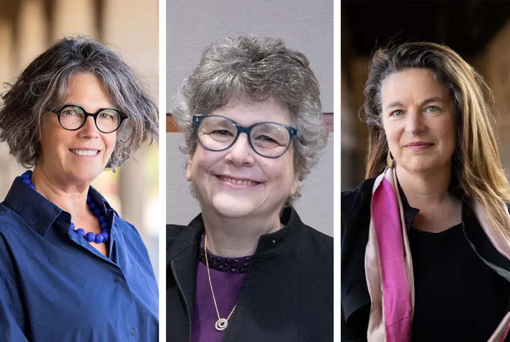 Photo of the three co-creators of the medical humanities minor: Tanya Luhrmann wearing glasses and a blue blouse; Audrey Shafer wearing glasses and a black blazer over a dark purple shirt; and Lara Wittman wearing a black blouse with a pink silk scarf draped over her shoulders 
